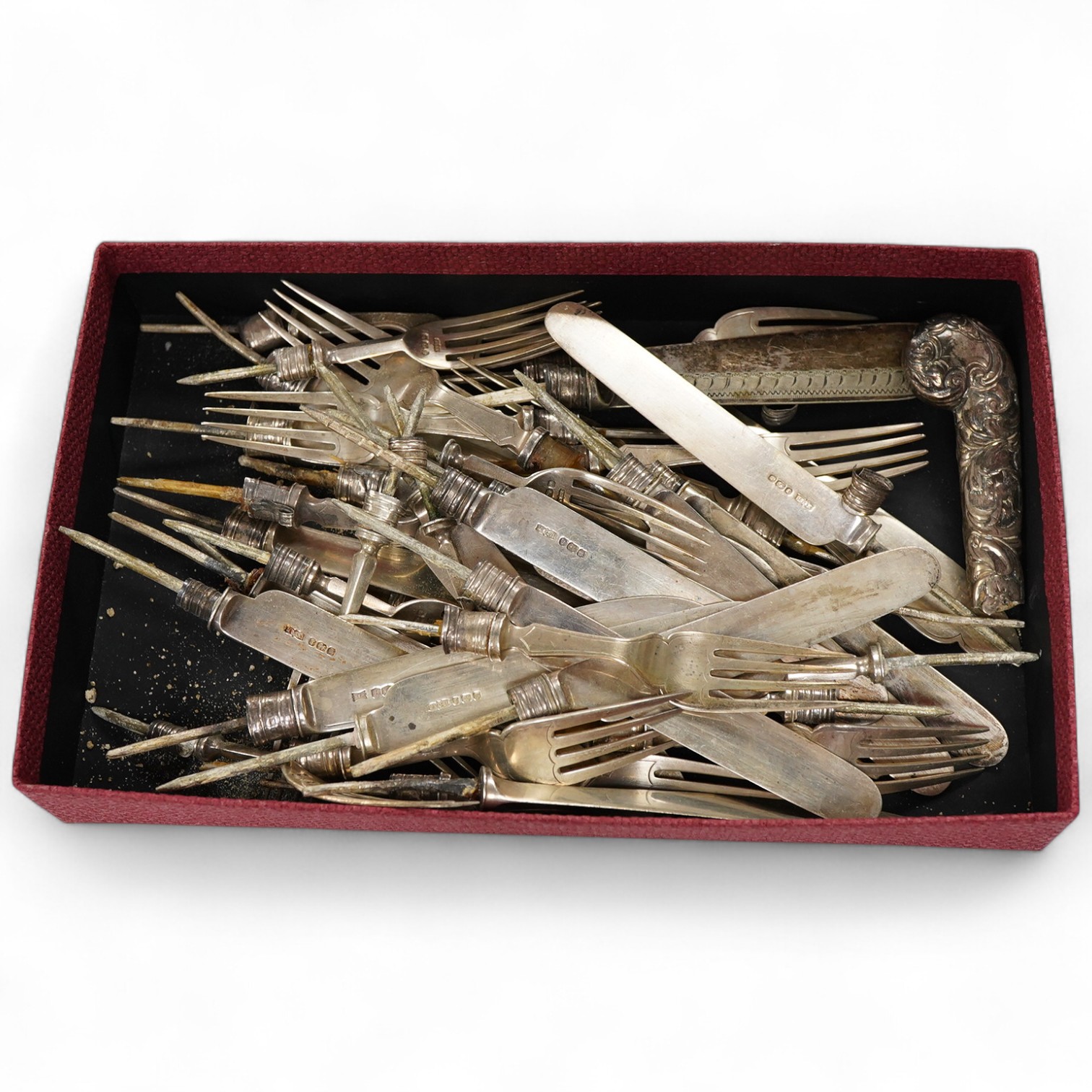 Eleven silver fish knife blades and eleven silver fork tines, by Walker & Hall, Sheffield, 1927 and 1933, eleven Victorian silver dessert knife blades and ten dessert fork tines, James Dixon & Sons, Sheffield, 1897, gros
